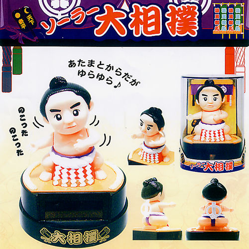 Sumo wrestler dancing doll powered by solar battery
